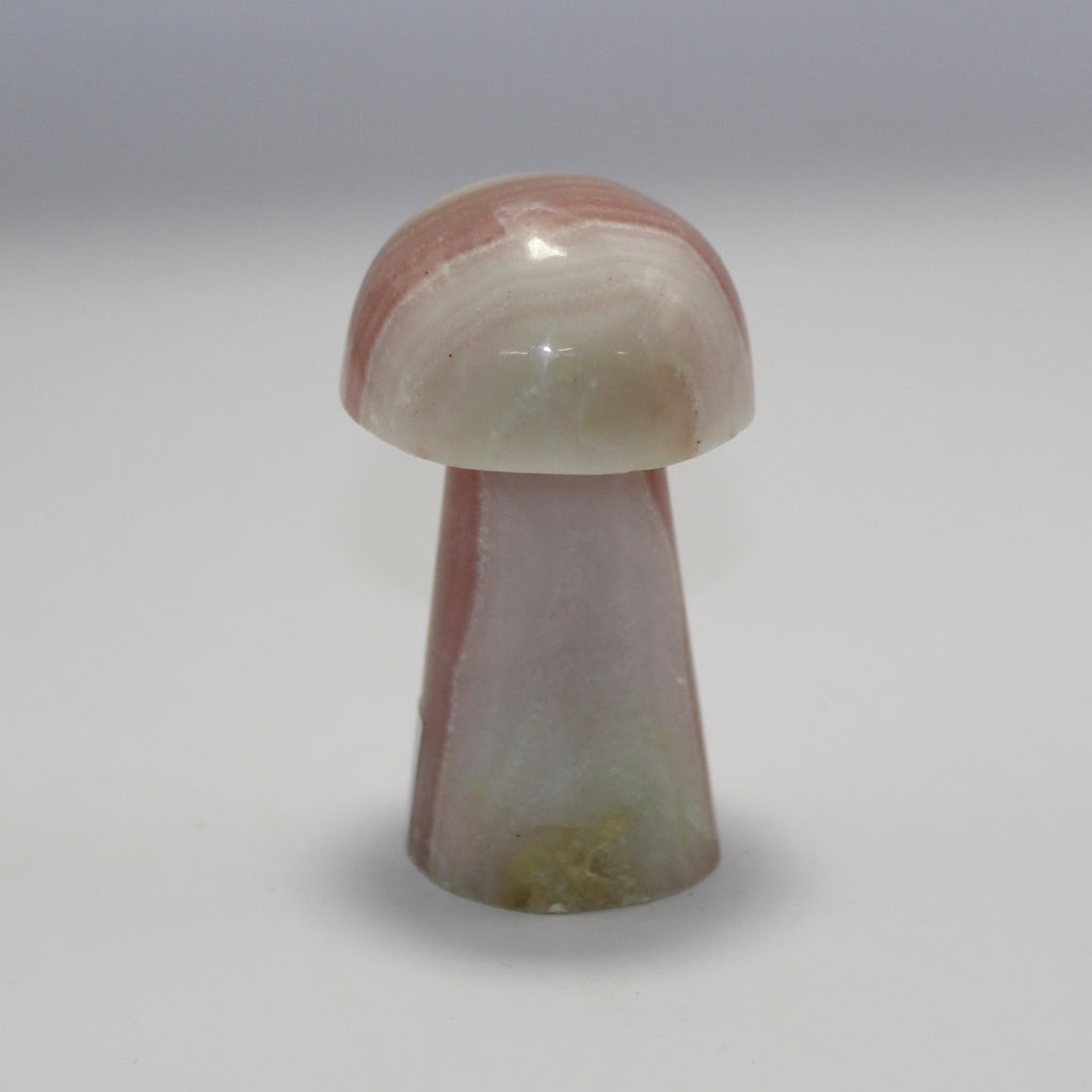 Pink calcite mushroom